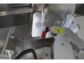 Machine d'étiquetage pour tube souple