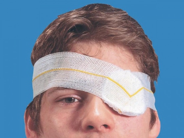 Compresse oculaire avec bandage tricoté