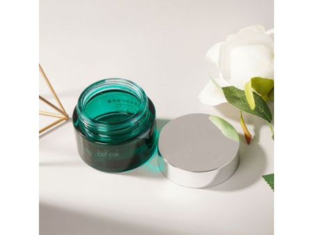 Pot de crème cosmétique en verre