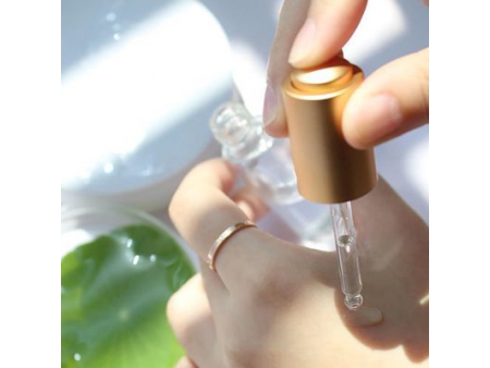 Flacon compte-goutte transparent à bouton poussoir