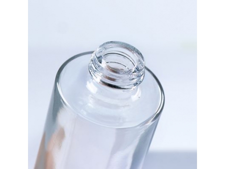 Flacon compte-goutte transparent à bouton poussoir