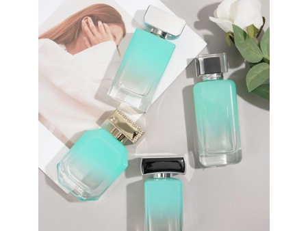 Flacon de parfum rectangulaire bleu et vert
