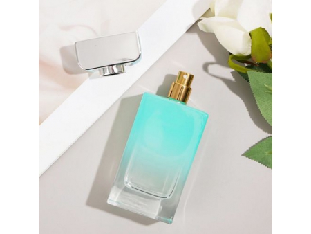 Flacon de parfum rectangulaire bleu et vert