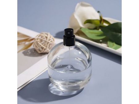 Flacon de parfum ovale dépoli et transparent