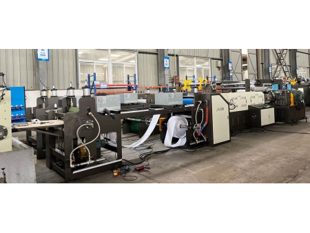 Machine d'enduction par extrusion de feuilles insonorisantes en butyle