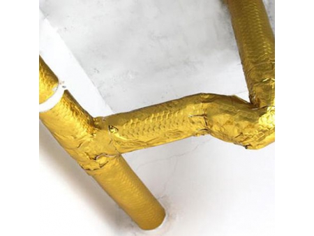 Machine d'enduction par extrusion de feuilles insonorisantes en butyle