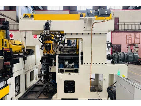 Machine à bobiner pour jantes avec système de chargement automatique