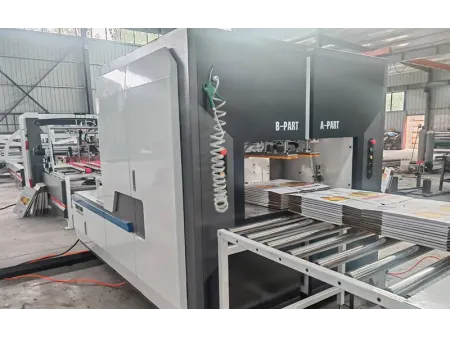 Machine de cerclage pour carton ondulé