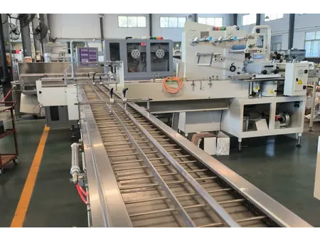 Machine de conditionnement horizontal sans barquette SF-G (conditionnement de biscuits sur chant à double goulotte)