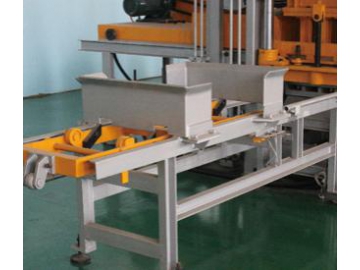 Machine de fabrication de blocs en béton QF400