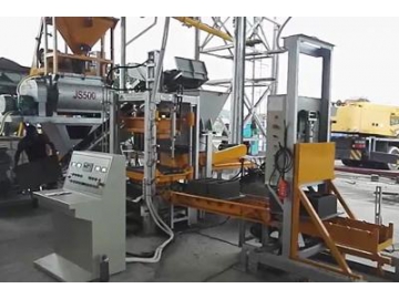 Machine de fabrication de blocs en béton QF400
