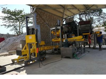 Machine de fabrication de blocs en béton QF400