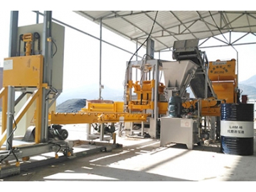 Machine de fabrication de blocs en béton QF400