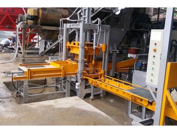 Machine de fabrication de blocs en béton QF400