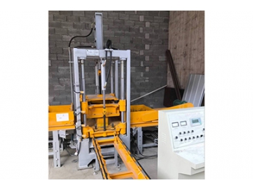 Machine de fabrication de blocs en béton QF400