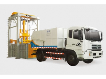 Station de transfert par compaction verticale