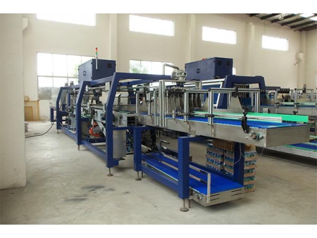 Fardeleuse automatique pour caisse