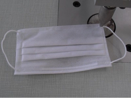 Machine de soudure ultrasons pour boucle de masque jetable