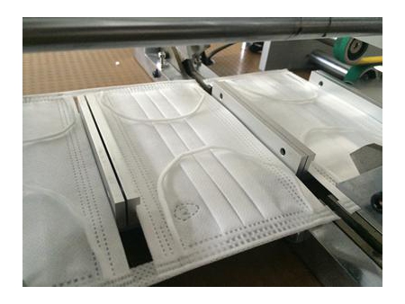 Machine de soudure ultrasons pour boucle interne de masque jetable