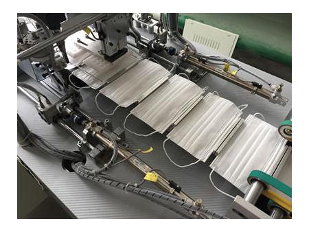Machine de soudure ultrasons pour boucle externe de masque jetable