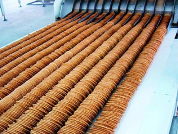 Empileur de biscuits rotatif