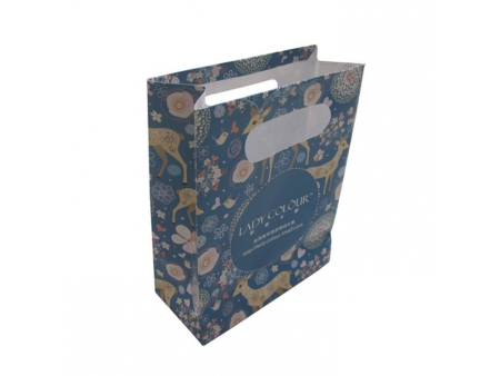 Sac en papier laminé avec poignée découpée