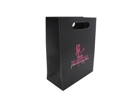 Sac en papier laminé avec poignée découpée