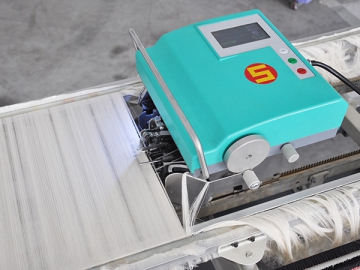 Machine à nouer les chaînes
