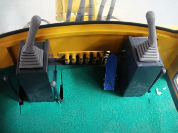 Chargeuse sur pneus à godet grappin